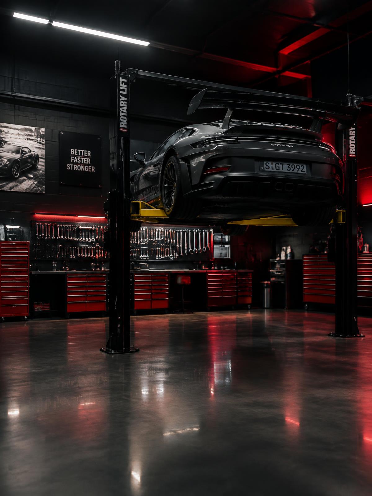 Lions Auto Care workshop interior with a car on the lift